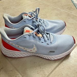 Blue with polka dot Nike Revolution running shoes